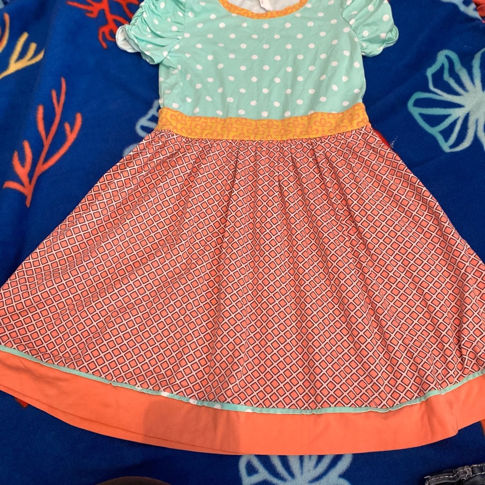Colorful Kids Dress with Polka Dots and Geometric Patterns